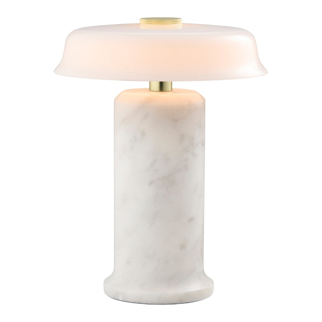 White marble lamp with opaque glass shade and brass accents. Elegant modern design with a smooth finish.