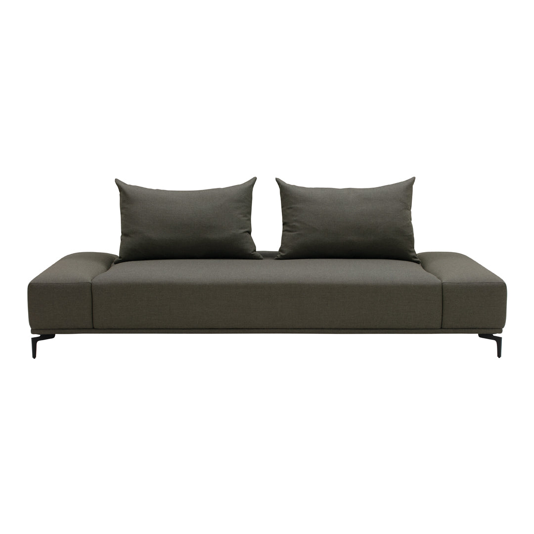 Stylish dark green sofa with smooth fabric and two matching cushions on a minimalist base. Perfect for modern interiors.