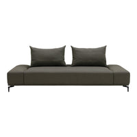 Stylish dark green sofa with smooth fabric and two matching cushions on a minimalist base. Perfect for modern interiors.