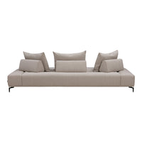 Modern beige sofa with textured fabric and plush, layered cushions for a cozy, contemporary look.