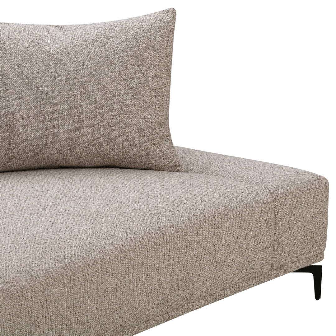 Beige textured fabric sofa with a matching cushion, featuring a subtle, cozy pattern and sleek black legs.