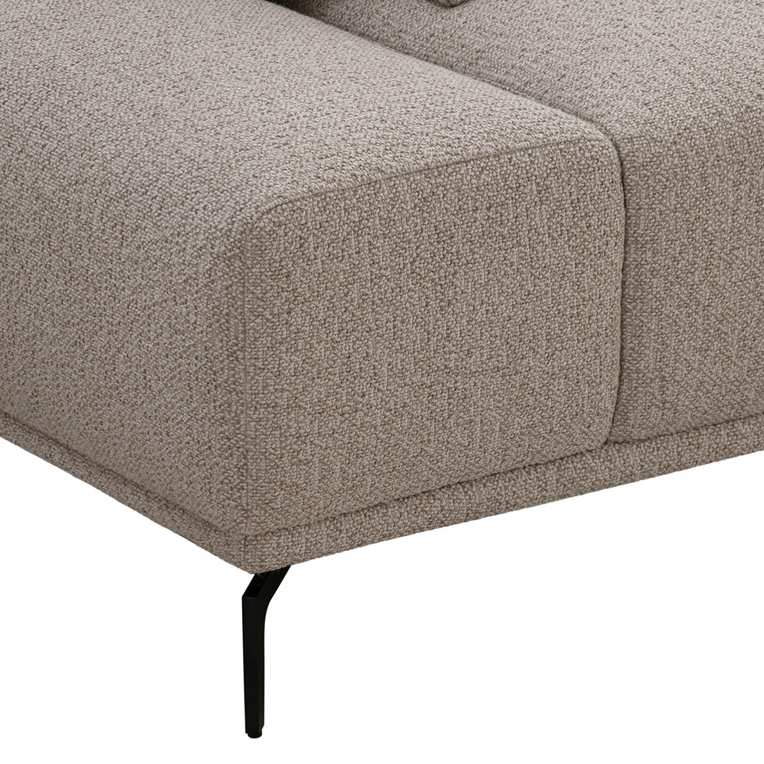 Beige textured upholstery with subtle patterns, complemented by sleek black metal legs.