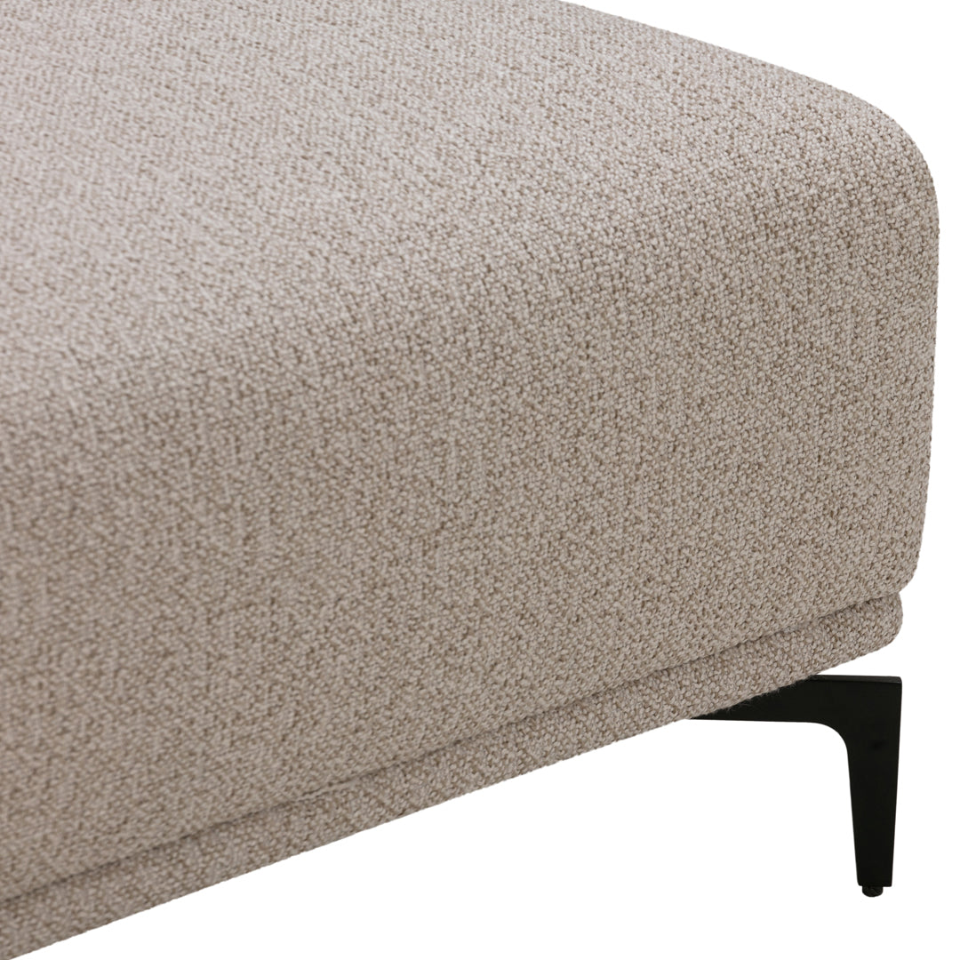 Beige textured upholstery with a subtle pattern, paired with sleek black legs. Perfect for modern decor.