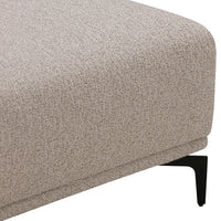 Beige textured upholstery with a subtle pattern, paired with sleek black legs. Perfect for modern decor.