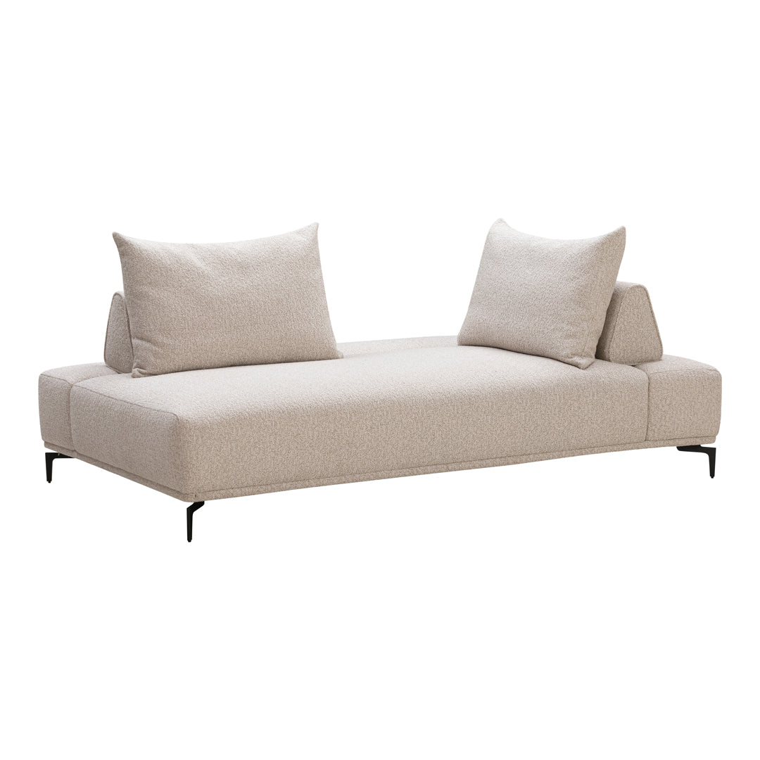 Beige upholstered sofa with minimalist design and two matching pillows, featuring sleek black metal legs.
