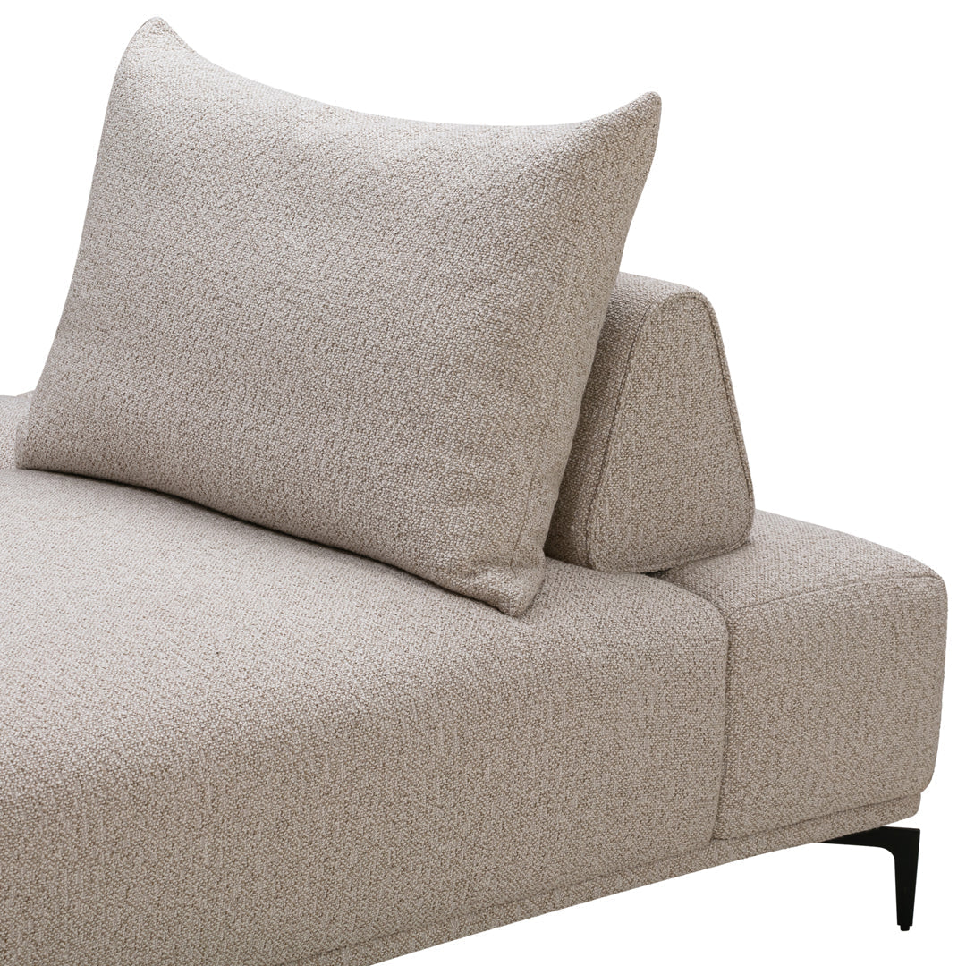 Beige textured fabric sofa with a matching cushion and minimalist design, perfect for modern interiors.