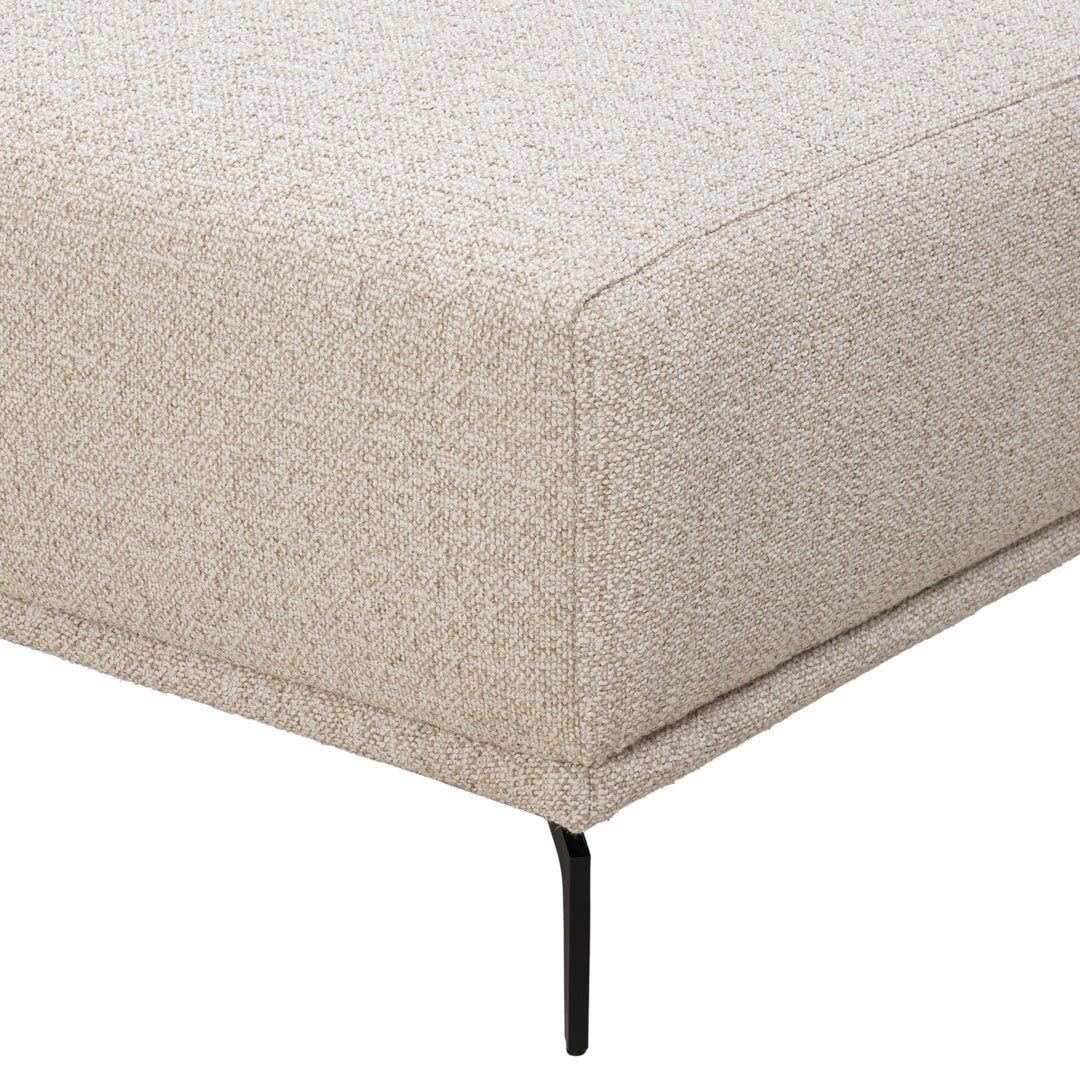 Beige textured upholstery with a subtle pattern, complemented by sleek black legs for a modern look.