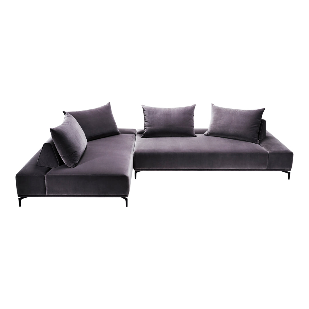 Modern gray sectional sofa with sleek lines and soft, plush cushions, perfect for contemporary living spaces.
