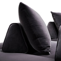 Dark gray velvet cushions with geometric shapes, creating a modern and stylish home decor accent.