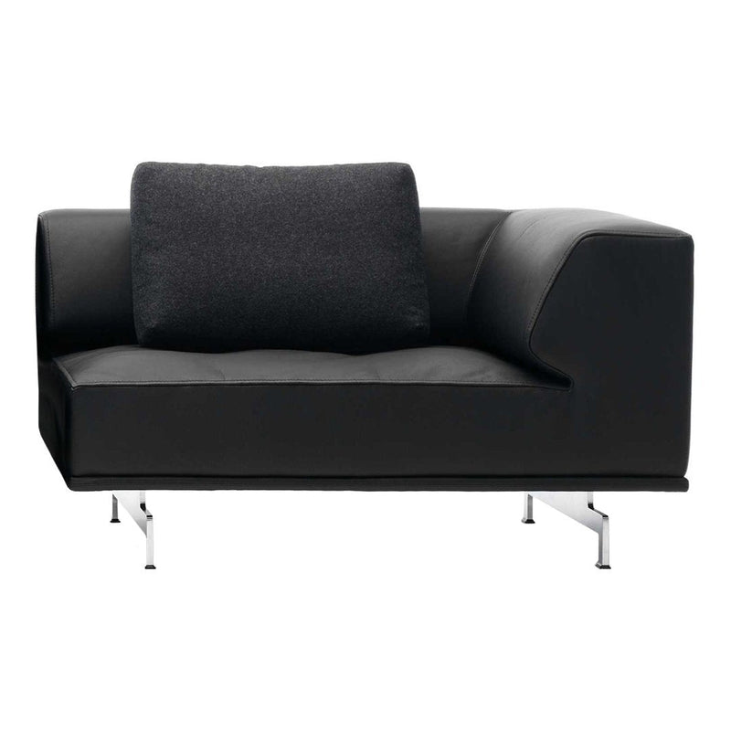 Black sofa with sleek, modern design and a textured gray cushion. Features minimalist chrome legs.