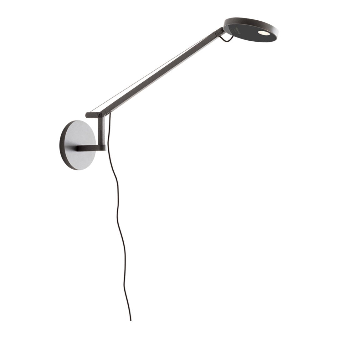 Sleek black and white wall lamp with a modern, minimalistic design and clean lines. Perfect for contemporary decor.