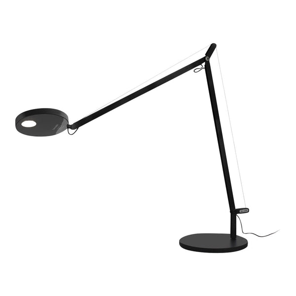 Sleek black desk lamp with a minimalist design featuring a round shade and a sturdy circular base.