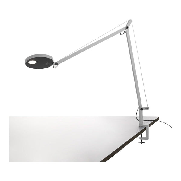 Modern white and black desk lamp with sleek, minimalist design and flexible arm. Ideal for contemporary workspaces.