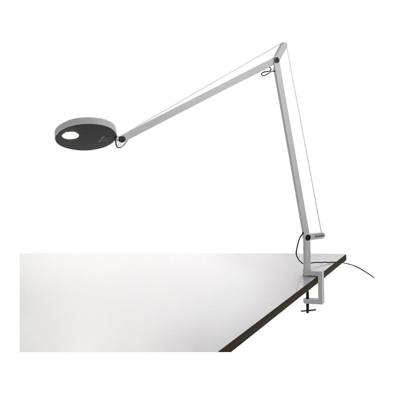 Modern white and black desk lamp with sleek, minimalist design and flexible arm. Ideal for contemporary workspaces.
