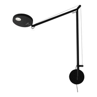 Sleek black modern wall lamp with a minimalist design and round shade, featuring a clean, contemporary pattern.