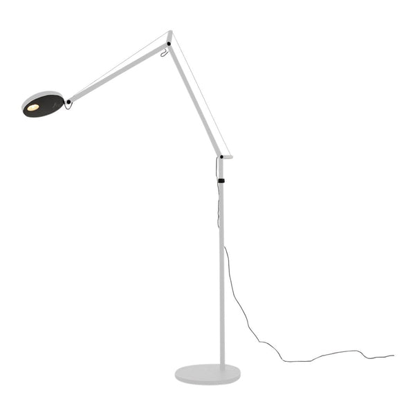 Modern black and white adjustable floor lamp with sleek lines and a minimalist design, perfect for contemporary decor.