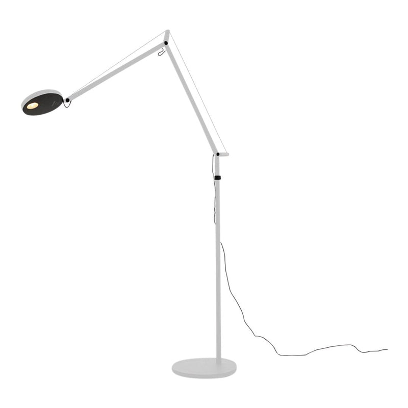 Modern black and white adjustable floor lamp with sleek lines and a minimalist design, perfect for contemporary decor.