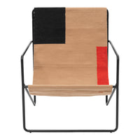 Modern chair featuring a geometric design with beige, black, and red blocks. Sleek metal frame for a stylish look.