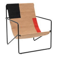 Modern beige lounge chair with black, red, and geometric patterns on fabric, set on a sleek black metal frame.