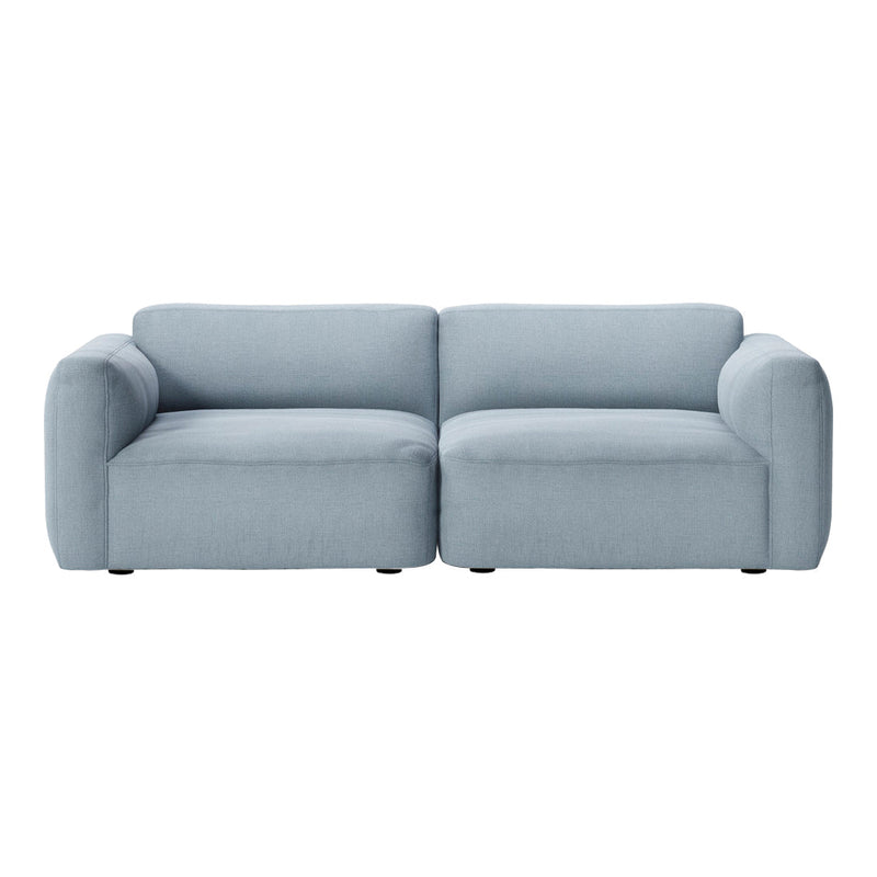 Light blue upholstered sofa with a smooth, modern design and minimalistic style. Perfect for contemporary interiors.