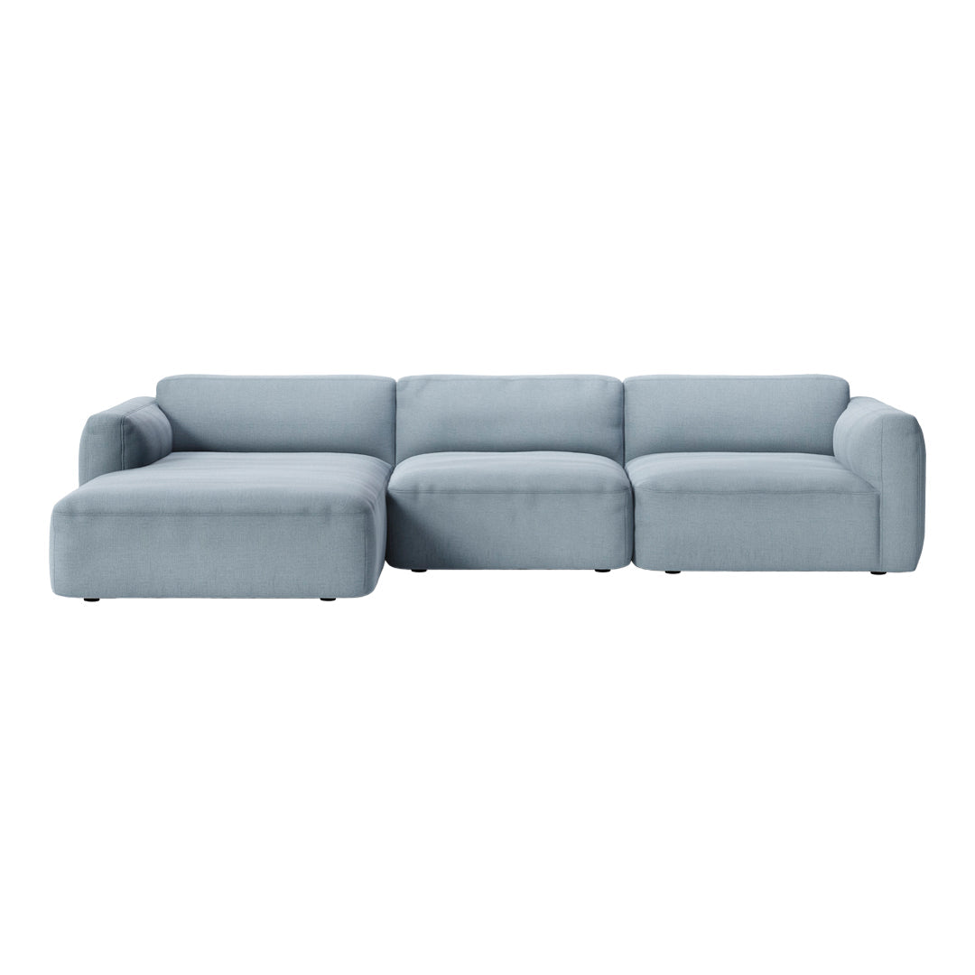 Light blue modern sectional sofa with sleek lines and a minimalist design, perfect for contemporary interiors.