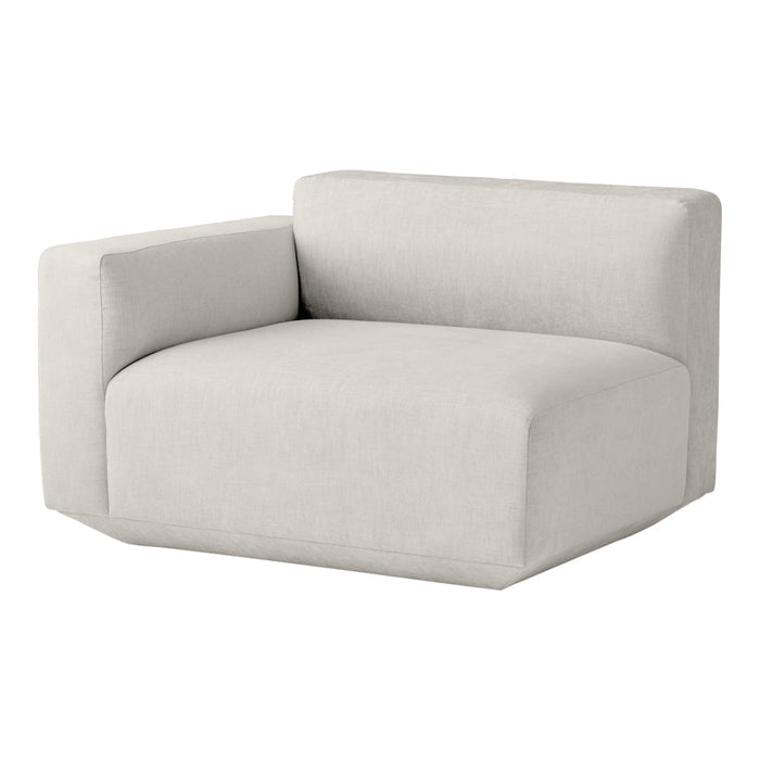 Light gray upholstered corner chair with a minimalist design and clean lines. Perfect for modern living spaces.