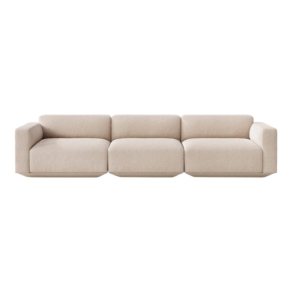 Beige fabric sofa with a modern, minimalist design and smooth, streamlined cushions. Perfect for contemporary interiors.