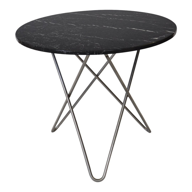 Round black marble table with subtle white veining and sleek silver metal tripod base. Modern design for any decor.