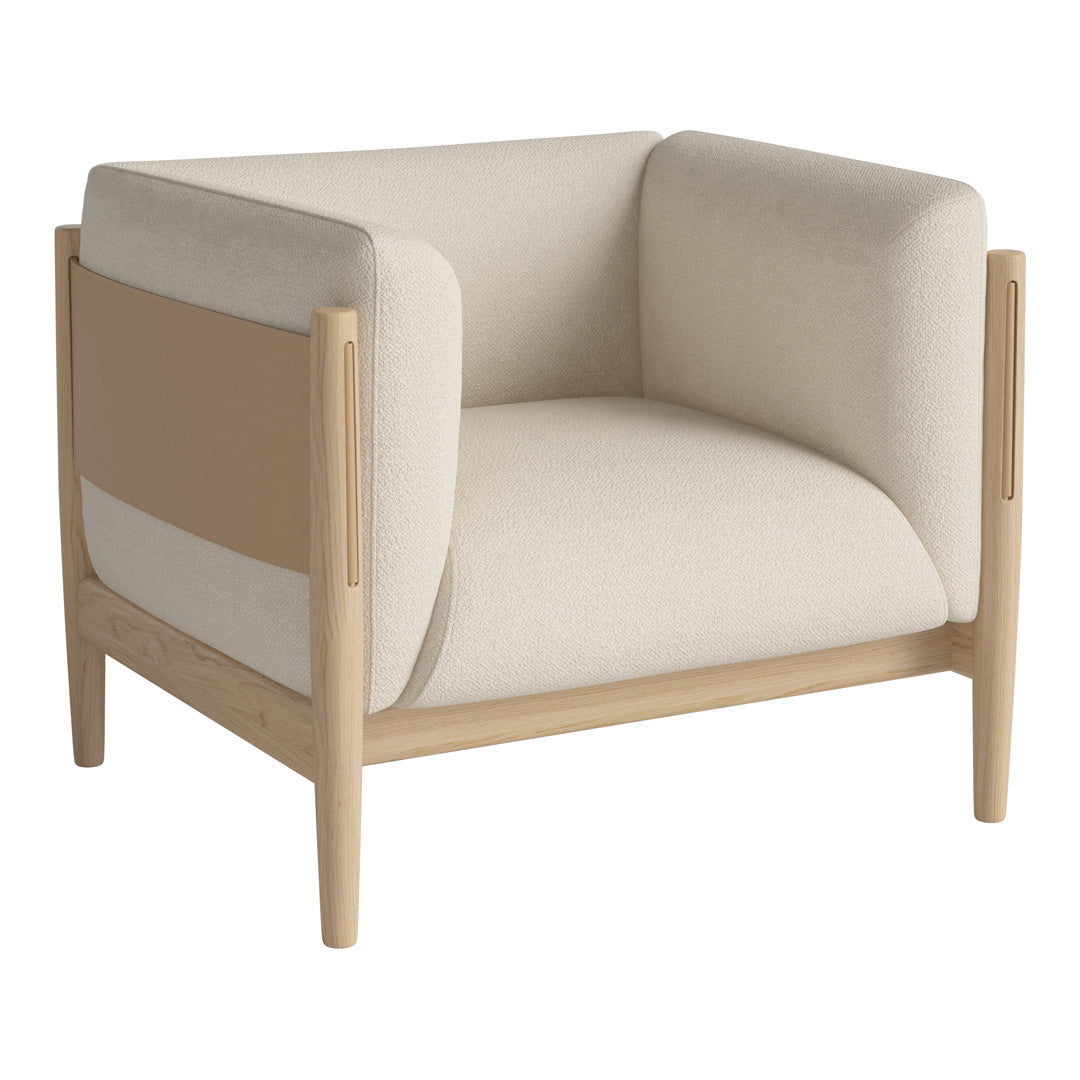 Light beige armchair with muted tan accents and minimalist design. Soft upholstery and natural wood frame.