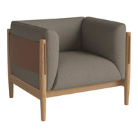 Gray and brown upholstered armchair with wooden legs and modern geometric design. Ideal for contemporary interiors.