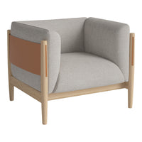 Gray upholstered armchair with a contrasting brown panel and light wooden frame, featuring smooth, modern lines.