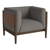 Gray upholstered armchair with a brown leather accent and wooden legs, featuring a minimalist design.