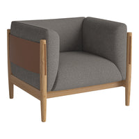 Modern gray armchair with brown leather accents and light wood frame, featuring a sleek minimalist design.