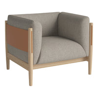Gray upholstered armchair with tan accent and light wooden frame, featuring a sleek, modern design.