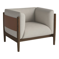 Beige and brown accent chair with a modern design and wood legs, featuring a contrasting colored side panel.