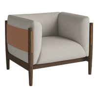 Light beige armchair with a contrasting brown wood frame and a warm terracotta accent. Modern and stylish design.
