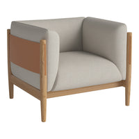 Beige and tan accent armchair with smooth, modern design and natural wood frame, featuring subtle color blocking.