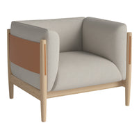 Light gray fabric chair with a tan accent panel and natural wooden legs, featuring a minimalist design.