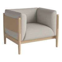 Beige and light brown armchair with a minimalist design and soft fabric upholstery. Modern, neutral color palette.