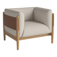 Beige armchair with brown and cream accents, featuring a modern, minimalistic design and wooden frame.