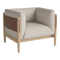 Beige armchair with soft brown accents and a minimalist design, featuring smooth lines and a wood frame.