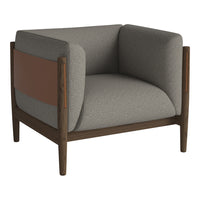 Gray upholstered armchair with brown leather accents and dark wood frame, featuring a modern minimalist design.