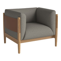 Modern gray armchair with a brown accent panel and light wood frame, featuring a minimalist design and clean lines.