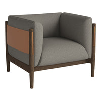 Gray and beige armchair with a brown accent and wooden legs, featuring a modern, minimalist design.