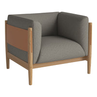 Gray upholstered armchair with a contrasting tan panel and light wood frame, featuring a modern minimalist design.