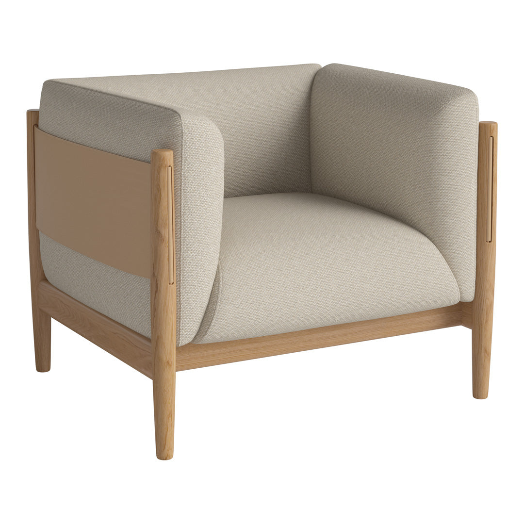 Beige and cream color-block upholstered armchair with natural wood frame. Modern, minimalist design.