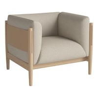 Beige and taupe armchair with soft, textured upholstery and a light wood frame. Modern and stylish design.