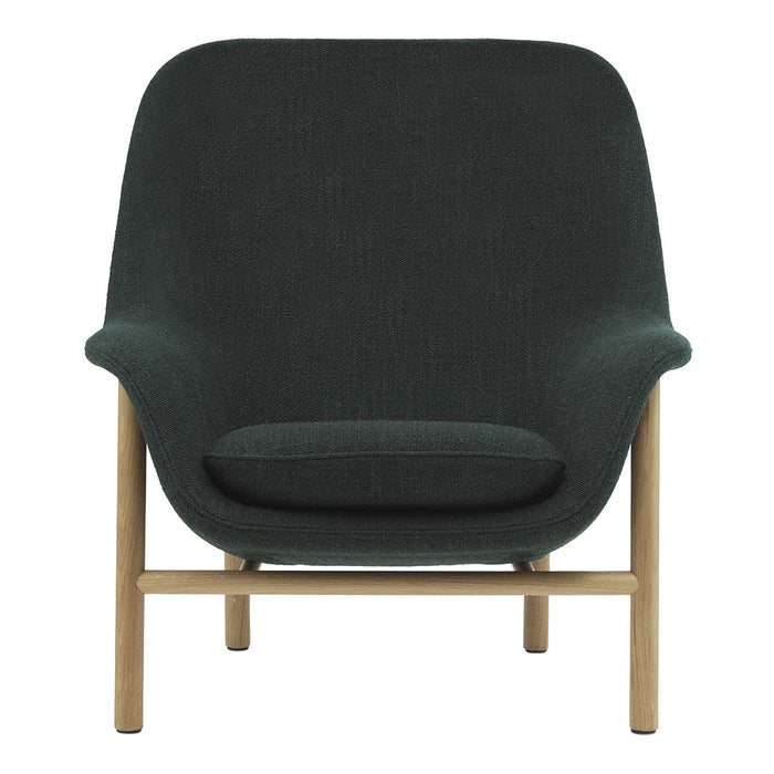 Dark green upholstered chair with a textured pattern and light wood legs, showcasing a modern, minimalist design.