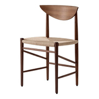 Brown wooden chair with a woven beige seat and an artistic half-moon backrest. Simple, modern design.