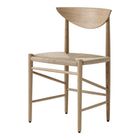 Natural wood chair with a light finish and woven seat, featuring a unique curved back design.